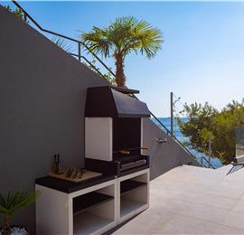 Luxury Beachfront Villa with Heated Infinity Pool near Trogir, Sleeps 8